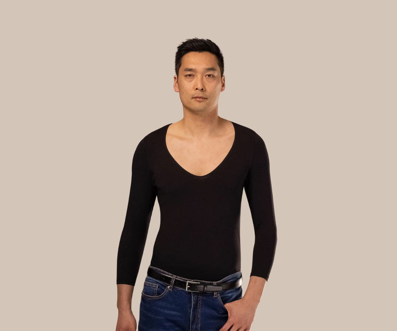 Man looking forward wearing long sleeve mens black undershirt