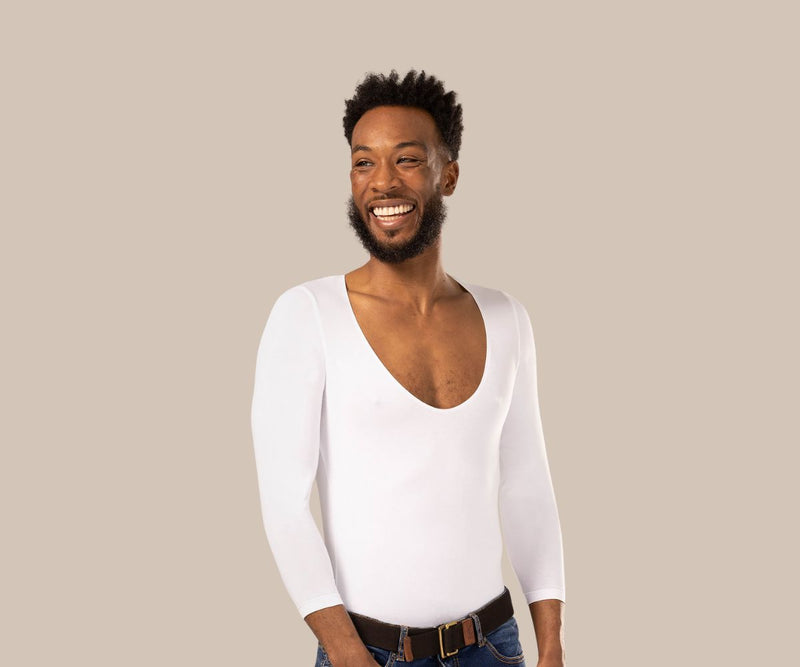 Smiling man wearing a long sleeve white mens vest