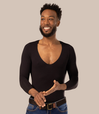 Smiling man wearing long sleeve men's black undershirt with v-neck