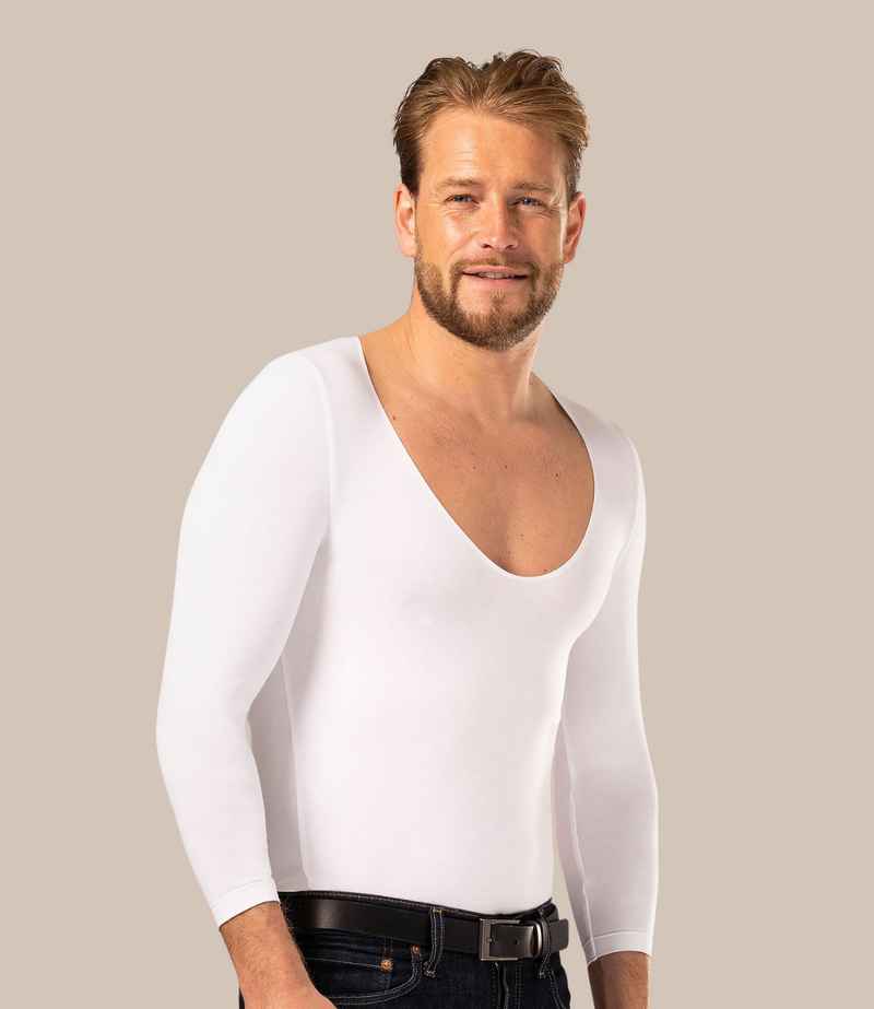 Man wearing long sleeve men's white undershirt with v-neck