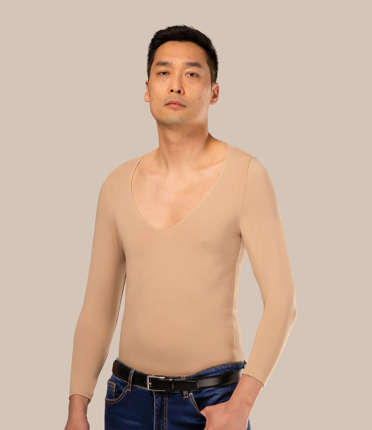 Asian man wearing skin tone mens undershirt 