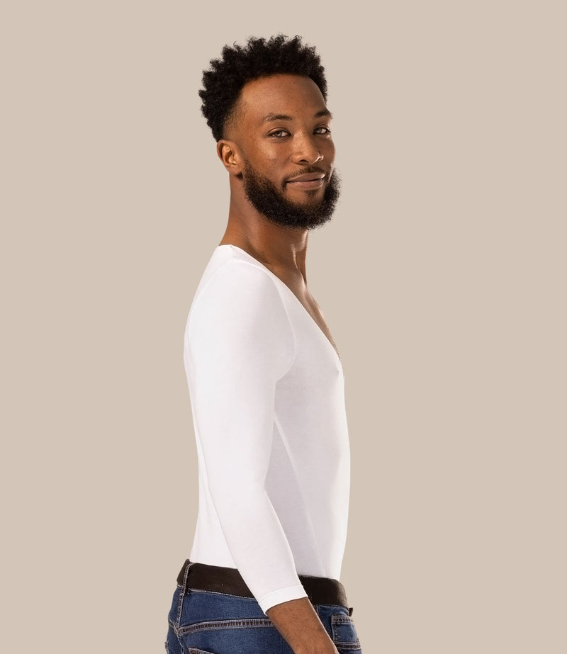 Man with dark skin tone wearing best mens v neck undershirt